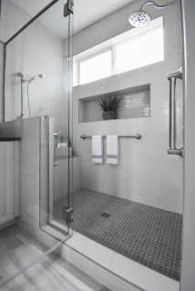 accent tile niche, bathroom accessibility, black countertop