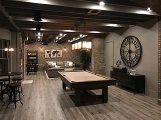 cocktail table, exposed beams, exposed brick