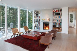 armchair, built in bookshelves, built-in bookshelf