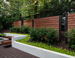aluminum pergola, brown deck, built in planter boxes